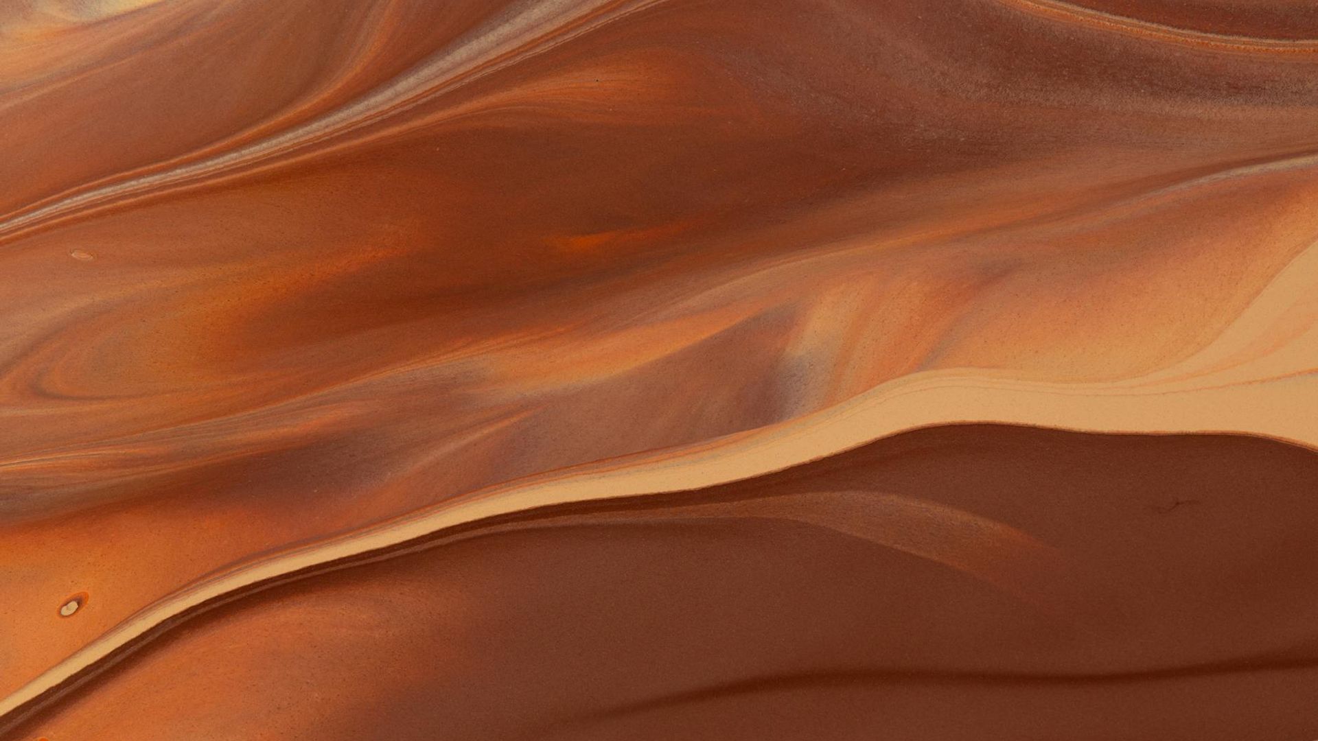 Abstract background image with fluid lines suggesting movement and calm.